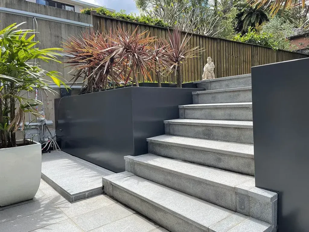 Sheet Metal Cladding Over Retainer Wall